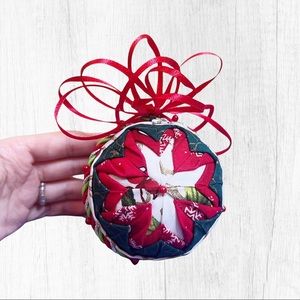 Handmade quilted fabric ornament